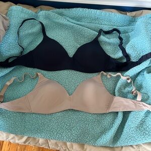 2 Small Calvin Klein bras.